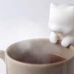 This adorable little robot cat will stop you burning your tongue on hot coffee